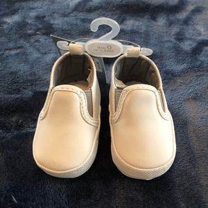 White crib shoes, ideal for baptism outfit